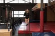 © Wavebreak Media - Young woman exercising in gym