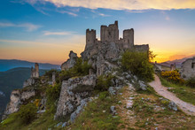 Rocca Calascio (Italy) - The Ruins Of An Old Medieval Village With Castle And Church, Over 1400 Meters Above Sea Level On The Apennine Mountains In The Heart Of Abruzzo, At Sunset.