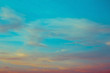 © Designer - blue and orange sky clouds at sunset or sunrise.