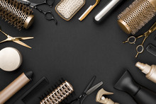 Hairdresser Tools On Black Background With Copy Space In Center