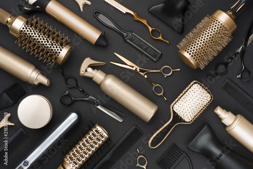 Fotomural Full frame of professional hair dresser tools on black background