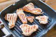 © Konstiantyn Zap - Sliced turkey fillet grilled in a frying pan. Fried meat without butter.