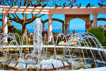 Wall Mural - Fountain and view to the Mediterranean Sea. Spain