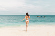 © Angel Ruiz Sanchez - Young girl in bikini posing and smiling on a beach of Thailand