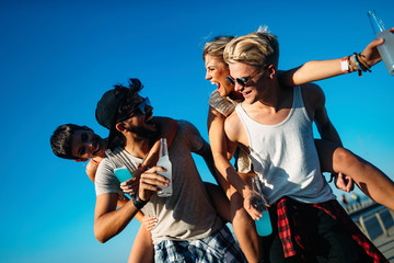 Group of young friends having fun together