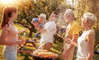 © ivanko80 - Happy family with barbecue outdoors