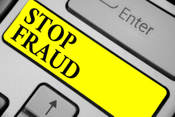 Writing note showing Stop Fraud. Business photo showcasing campaign advices people to watch out thier money transactions Keyboard yellow key Intention computer computing reflection document.