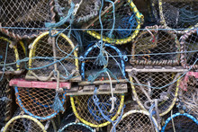 Stacked Lobster Fishing Pots Netted Boxes At Harbour Wall