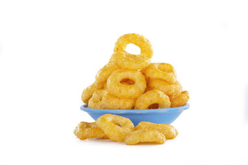 Wall Mural - Corn rings snacks in a bowl isolated on a white background