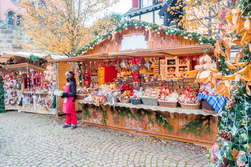 Wall Mural - Christmas market under the snow in France, in Strasbourg, Alsace