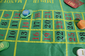 A casino table with colored casino chips