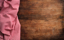 Red White Checkered Picnic Tablecloth On Wooden Background, Copy Space