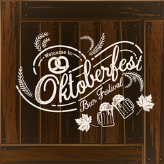 Wall Mural - Oktoberfest hand drawn vector lettering and beer glass. Modern brush calligraphy. Wood background.