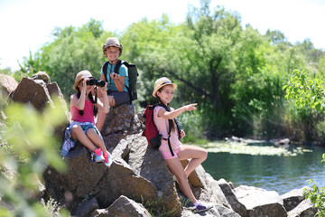 Wall Mural - little children with traveling gear outdoors. summer camp