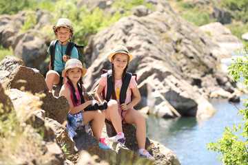 Wall Mural - little children with traveling gear outdoors. summer camp