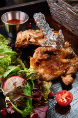 Wall Mural - fried chiken and vegetable salad on a tray