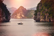 © DannyIacob - Halong bay boats,Sunset at Ha Long Bay scenic view , Hanoi, Vietnam