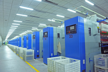 Fototapeta Machinery and equipment in a spinning production company