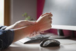 © artursfoto - Office syndrome - Young female suffering from hand pain while using computer at workplace. Occupational risk factor. Health care and medical concept.