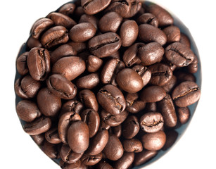 Wall Mural - Grains of coffee on white background, close-up. View from above.