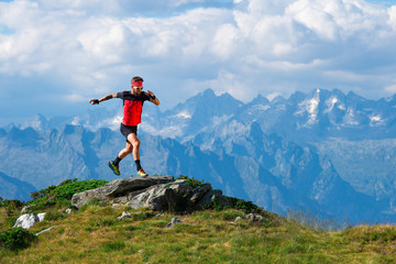 skyrunning athlete in training on mountain ridges