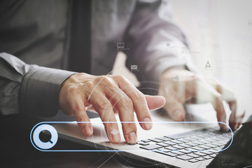 Aufkleber - close up of businessman working with laptop computer on wooden desk in modern office with virtual icon diagram