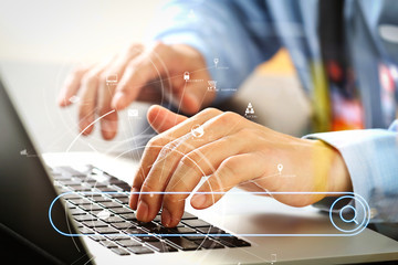 Aufkleber - close up of businessman typing keyboard with laptop computer on wooden desk in modern office with virtual reality icon diagram