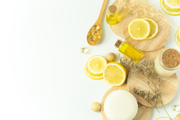 lemonade with cosmetic spa soap oil mockup in beauty skincare treatment healthy concept, top view of nutrition lemon for facial