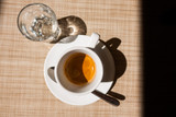 Caffe corretto, traditional Italian beverage with espresso and a shot of liquor, usually grappa