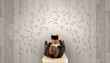 © ra2 studio - Letters with writer using tablet in a beige chair and an office space