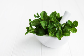 Mortar with fresh mint