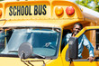 © LIGHTFIELD STUDIOS - handsome senior school bus driver looking at camera