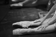 © Anna Jurkovska - Ballerina in pointe shoes, sitting on the floor behind the scenes in the intermission of the ballet