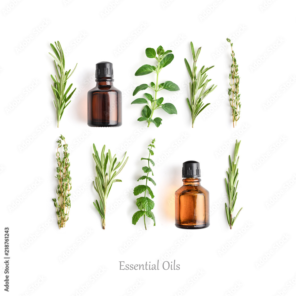 Bottles with essential oils and fresh herbs - obrazy, fototapety, plakaty 