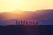© Photocreo Bednarek - Group of happy people at sunset