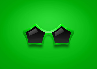 Wall Mural - Fashion sunglasses with star shape on green background. Celebration glasses party.