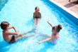 © Pixel-Shot - Cute children playing in swimming pool on summer day
