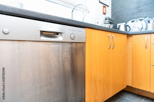 Closeup Of Side Of Modern Wood Wooden Finish Kitchen Drawers With