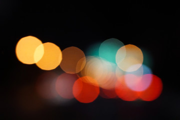 colorful street circle bokeh light dark background