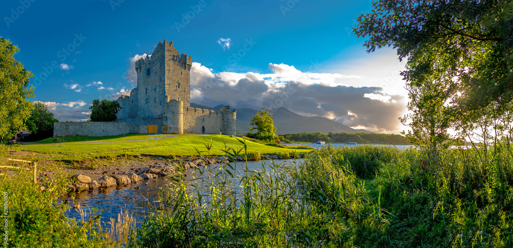 Idyllic landscape of Ross Castle in the Killarney National Park in Ireland. Travel by car through the Ring of Kerry. - obrazy, fototapety, plakaty 