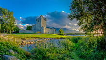 Idyllic Landscape Of Ross Castle In The Killarney National Park In Ireland. Travel By Car Through The Ring Of Kerry.