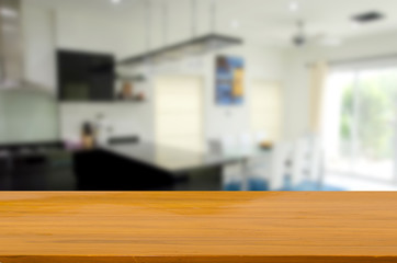 Wall Mural - wood table top and blur kitchen room