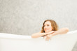 © pic for you - Young woman relaxing in bath.beautiful woman lying in bathtub.