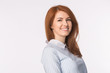 © satura_ - Beautiful young redhead smiling woman isolated on white