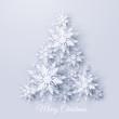 © Oksana Kumer - Vector Christmas and new year holidays background with Christmas tree made of realistic looking paper cut snowflakes. Seasonal Merry Christmas and Happy New Year greeting card