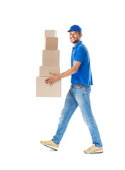 Canvas Print - Full length profile portrait of courier  walking and carrying stack of boxes