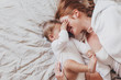 Leinwandbild Motiv Young mom with her 8 month baby