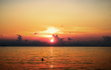 Wall Mural - sunset on the beach with beautiful sky