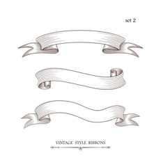 Wall Mural - set of vintage curved ribbons. engraving style vector illustration. retro hand drawn labels, banners