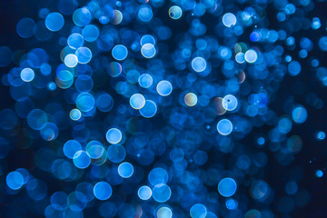 Blue glitter bokeh lights bokeh defocused